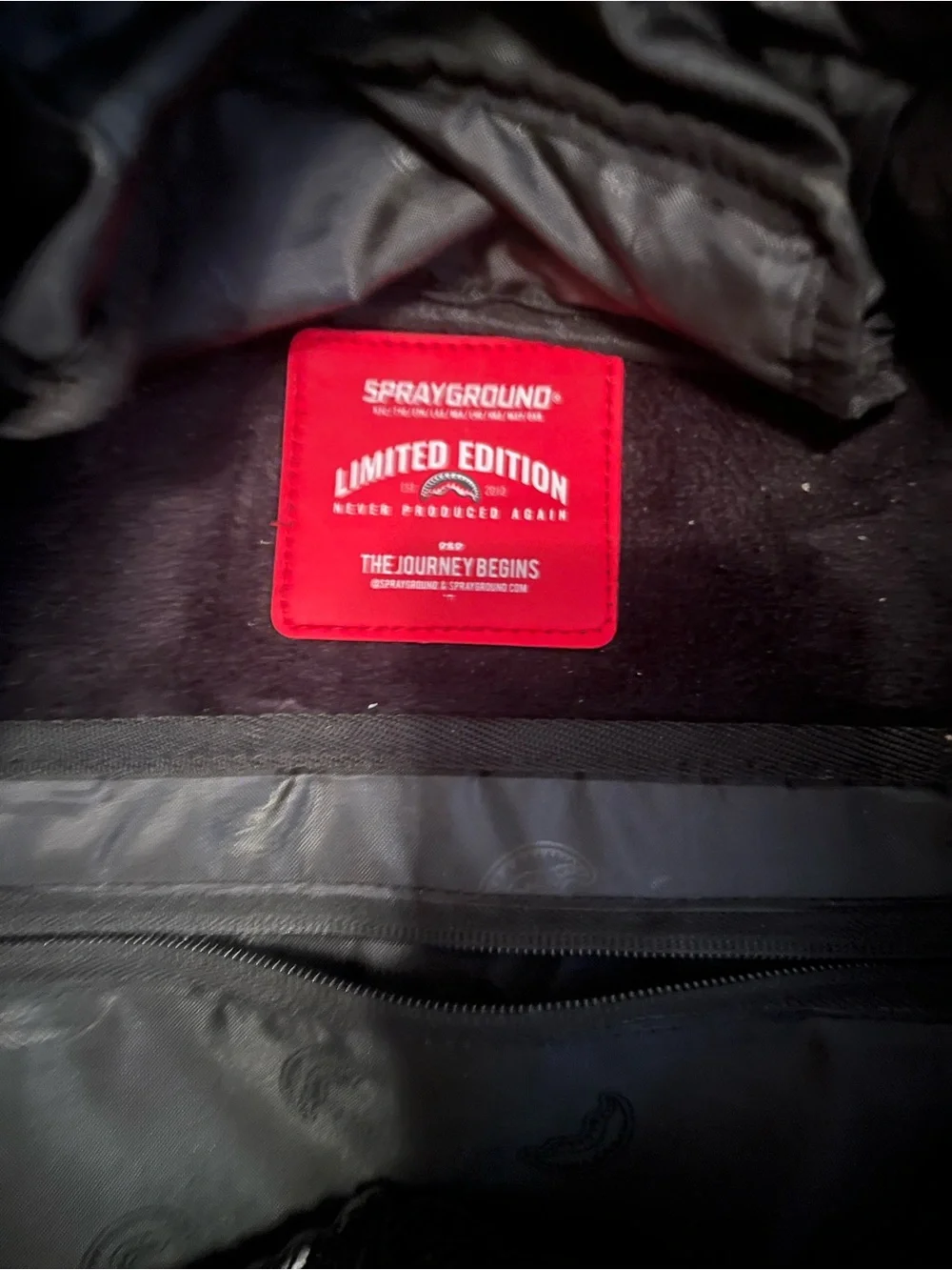 Sprayground Light Blue Backpack.